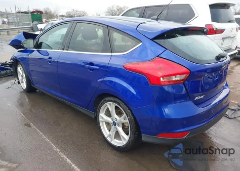 2015 Ford Focus Titanium z USA, uszkodzony, nr VIN 1FADP3N28FL268901